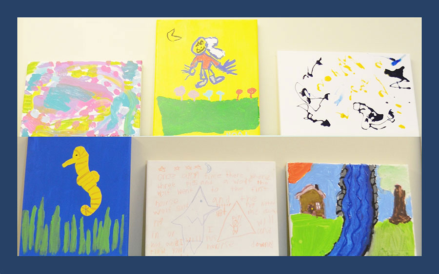 The image displays a collection of colorful paintings with various subjects, including abstract designs, landscapes, and figures, arranged on a wall.